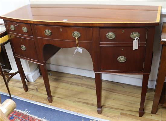 A George III style bowfront sideboard W.138cm.
